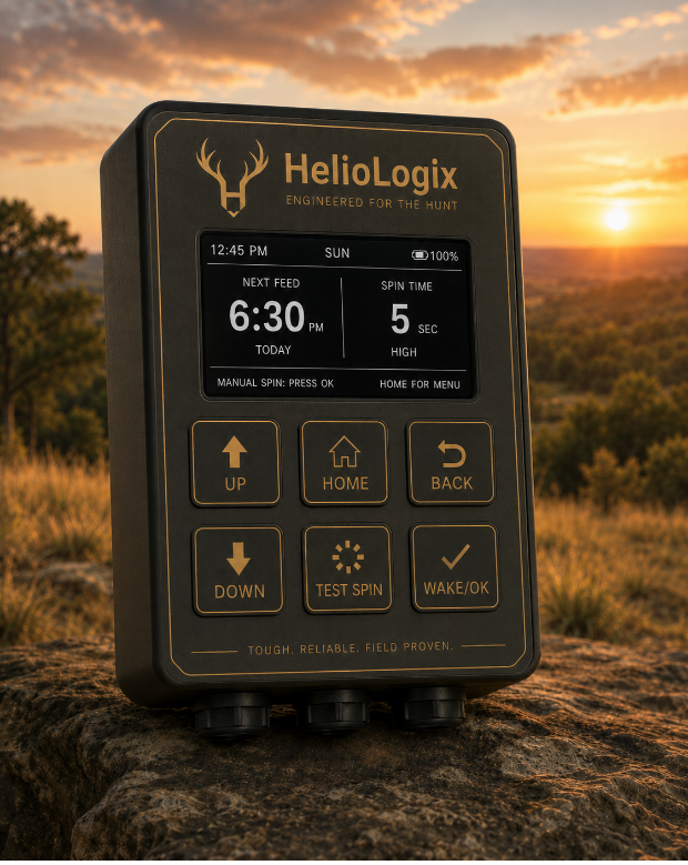 HelioLogix solar feeder timer on a rock at sunset, screen showing the next feed time and spin duration